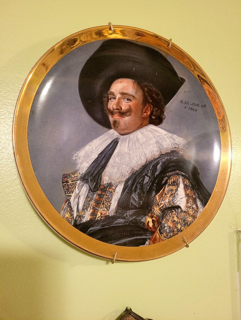 Decorative Round Portrait Wall Plate in Black and Gold